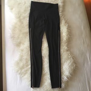 Athleta gold zippered leggings